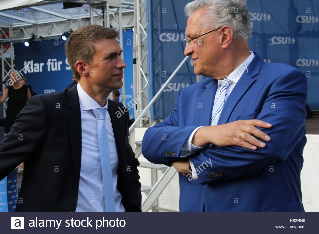 CSU politician Joachim Herrmann in conversation with MP stefan Muller at an election campaign event in Bavaria  Germany. Stock Photo