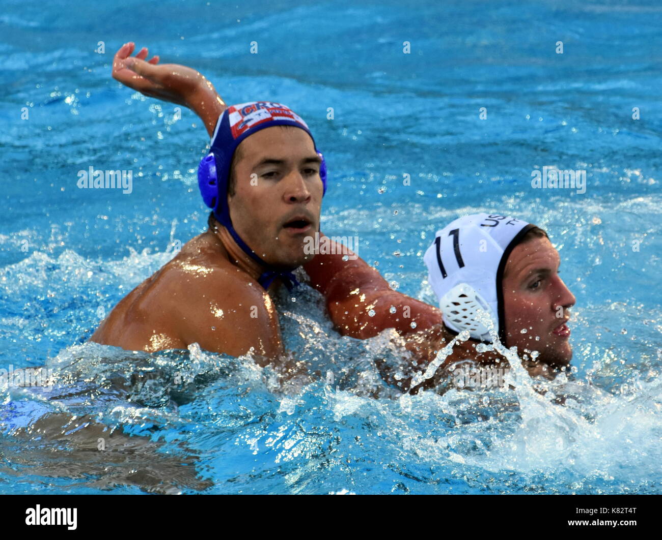 Budapest, Hungary - Jul 17, 2017. KRAPIC Ivan (CRO) playing against ROELSE Alex (USA) in the preliminary round. FINA Waterpolo World Championship was  Stock Photo