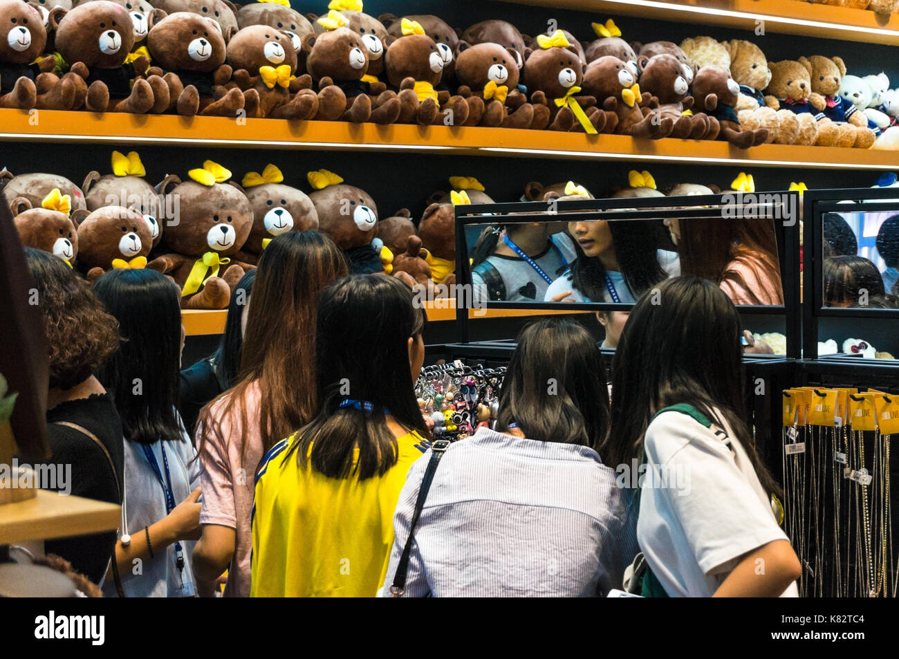 Chinese girls shopping at a trendy store in Shenzhen, China Stock Photo