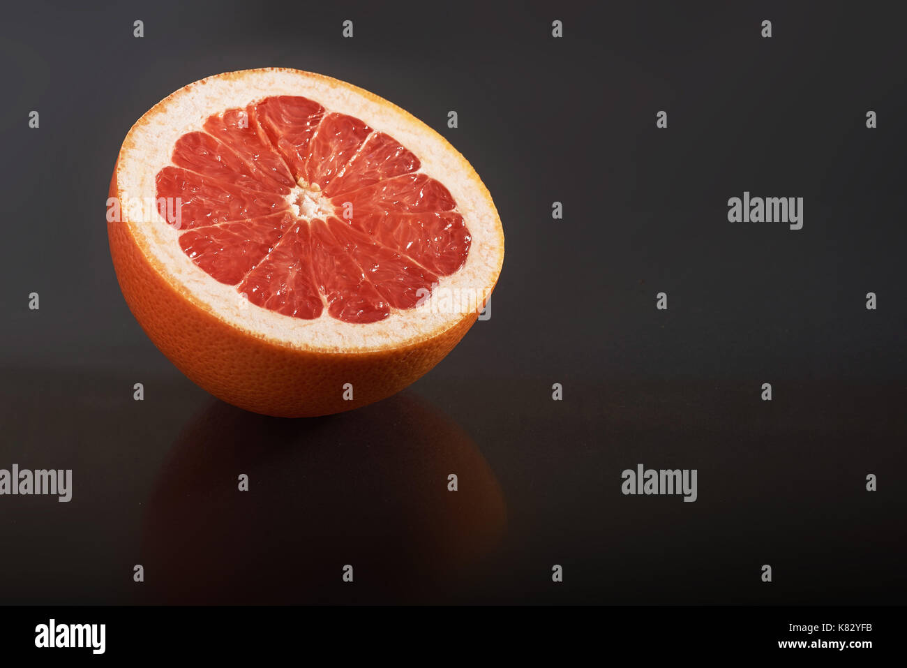Grapefruit isolated on a black background Stock Photo