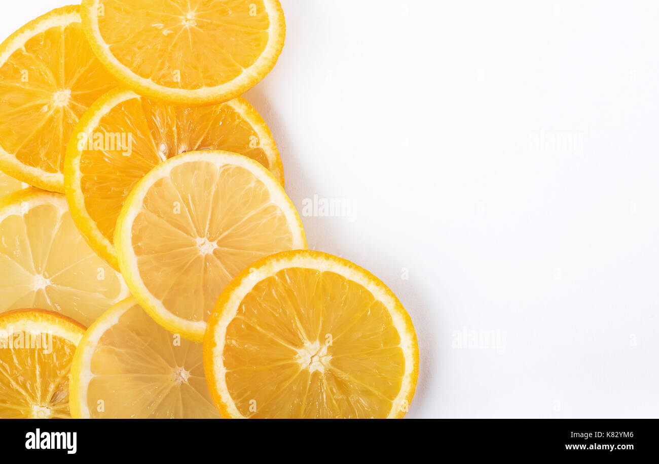 slices of orange and lemon isolated on a white background Stock Photo ...