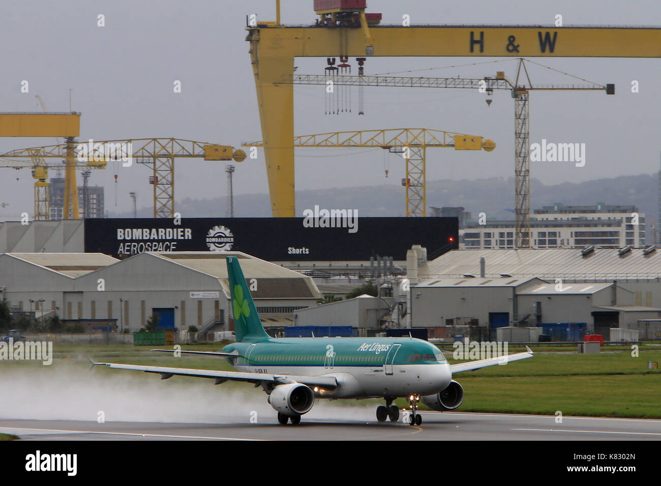 Aircraft arrive and depart from George Best Belfast City Airport, Belfast, Northern Ireland. Stock Photo