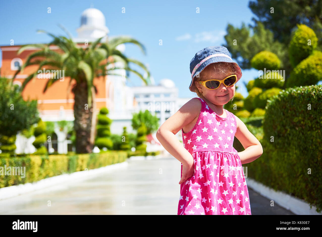 Portrait of a happy child wearing sunglasses outdoors in summer day. Amara Dolce Vita Luxury Hotel. Resort. Tekirova-Kemer. Turkey. Stock Photo