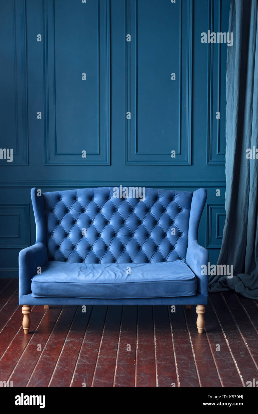 Antique wood sofa couch in vintage room. Classical style armchair Stock