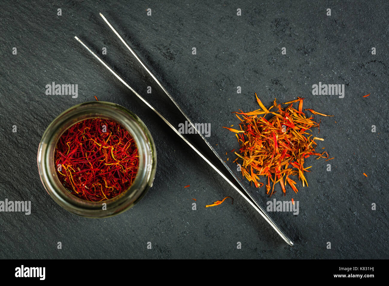 Moroccan (left) and Turkish (right) saffron. hey are often used in Arabic cuisine. Stock Photo