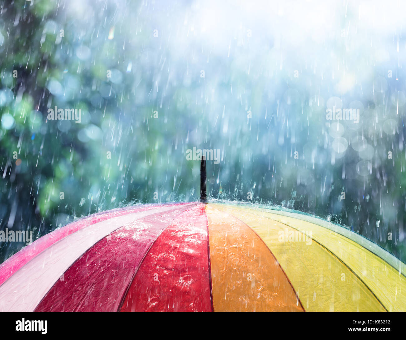 Rain On Rainbow Umbrella Stock Photo Alamy Rain On Rainbow Umbrella Stock Photo Alamy