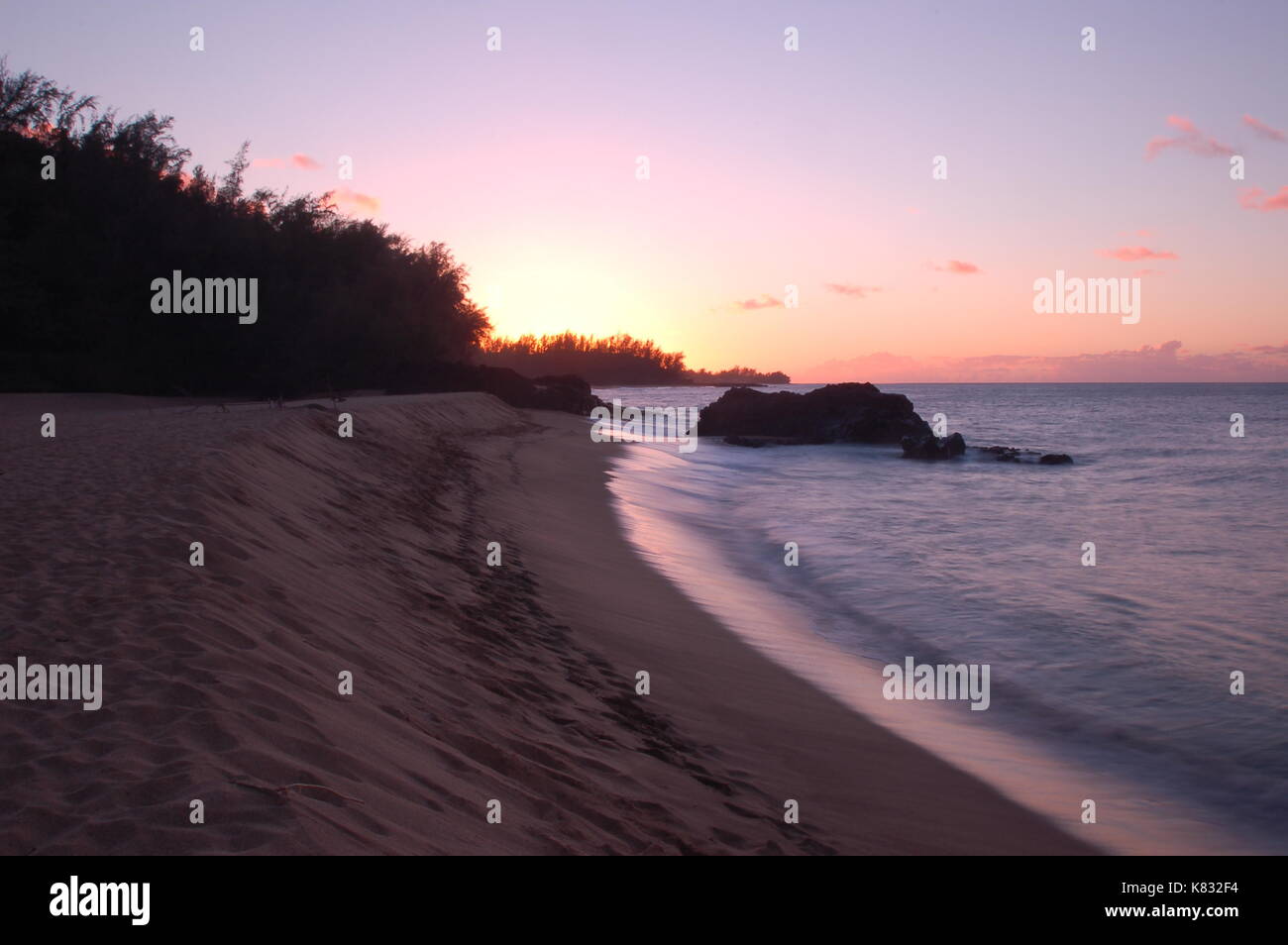 Sunset on Lumahai Beach in Kauai Stock Photo Alamy