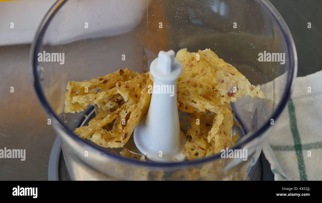 preparation of cream cheese for Italian dishes. Cheese in the mixer