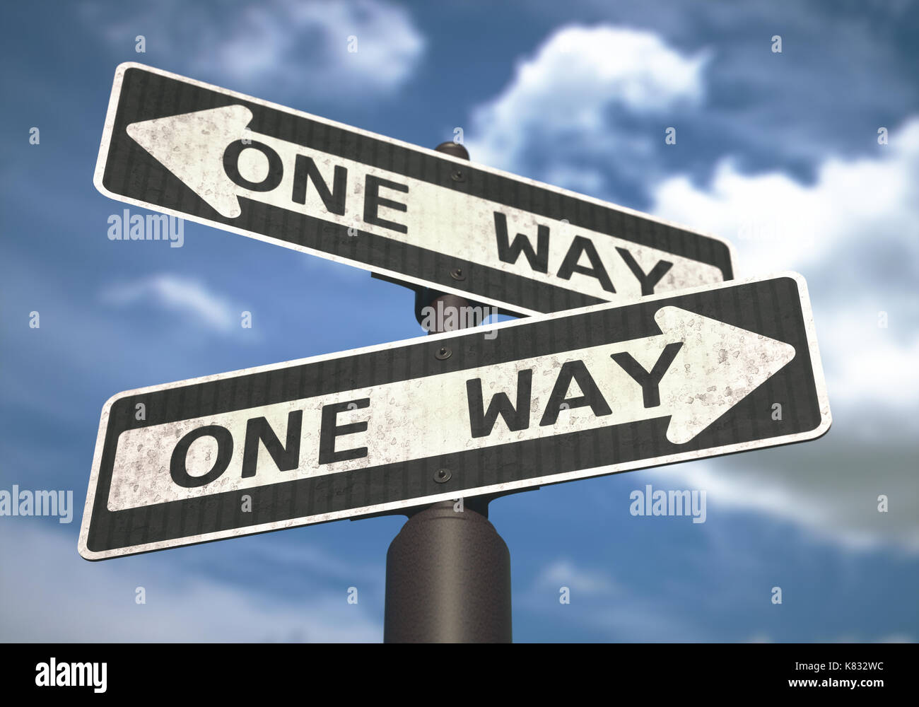 Conceptual image of one-way sign with cloud and blue sky in the background. Stock Photo