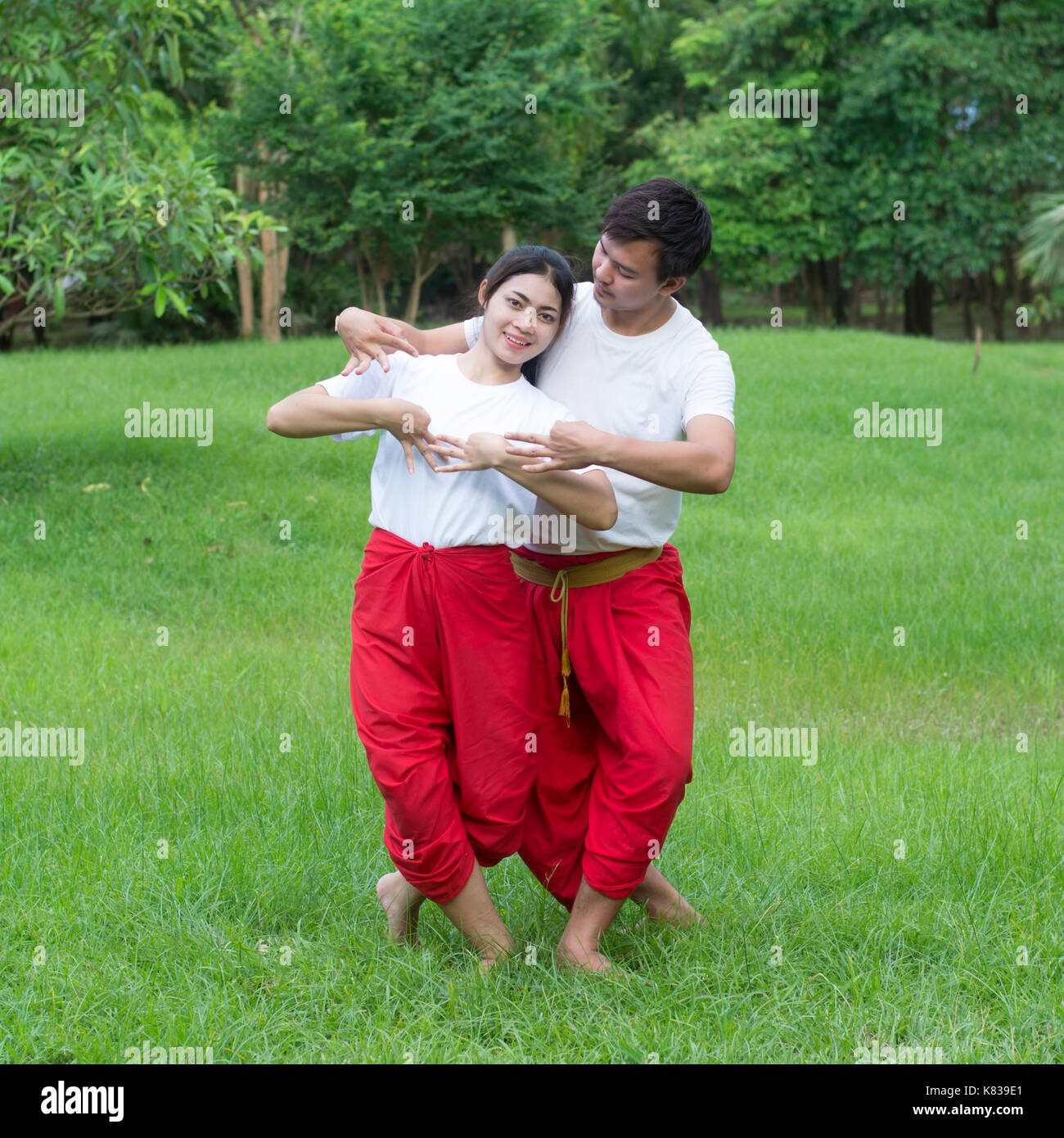 Asian young boy and girls learning Thai dance. Classical Dance in white