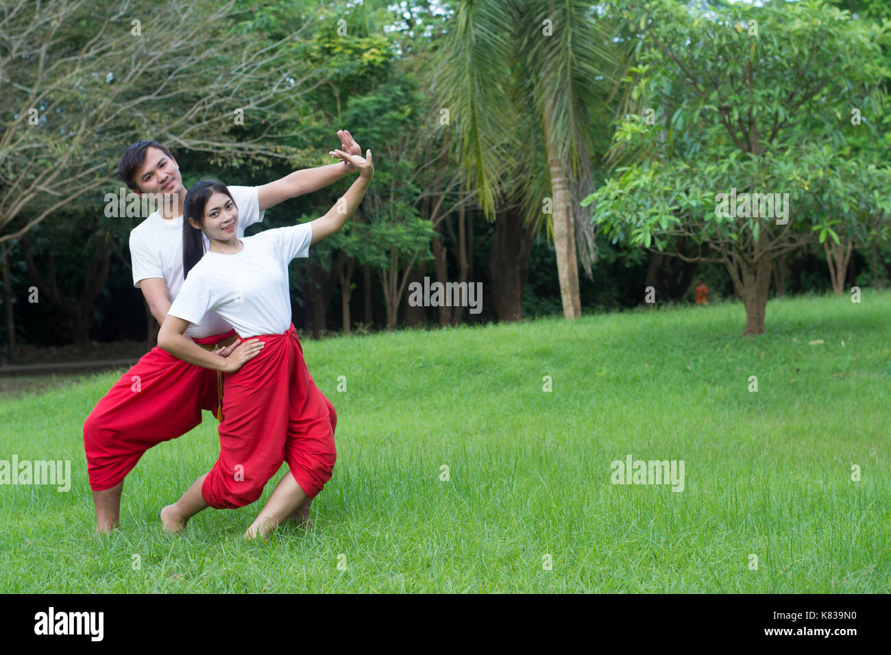 Asian young boy and girls learning Thai dance. Classical Dance in white