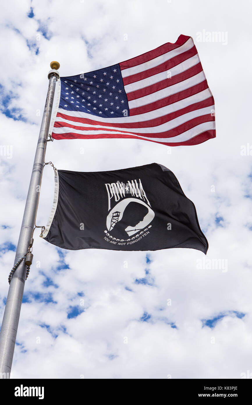 The American Flag flys over a POW-MIA flag at a memorial in California USA Stock Photo