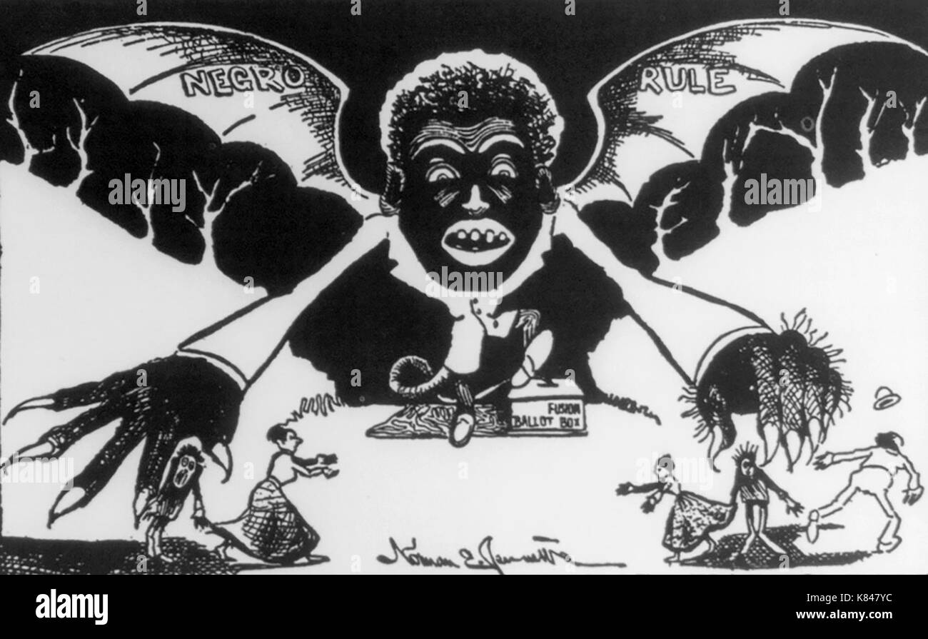 Cartoon used in the campaign for the ratification of the North Carolina disfranchising constitution: shows hideous Negro vampire bat 'Negro Rule' rising from a 'fusion (3rd party) ballot box'. Political Cartoon, 1900 Stock Photo