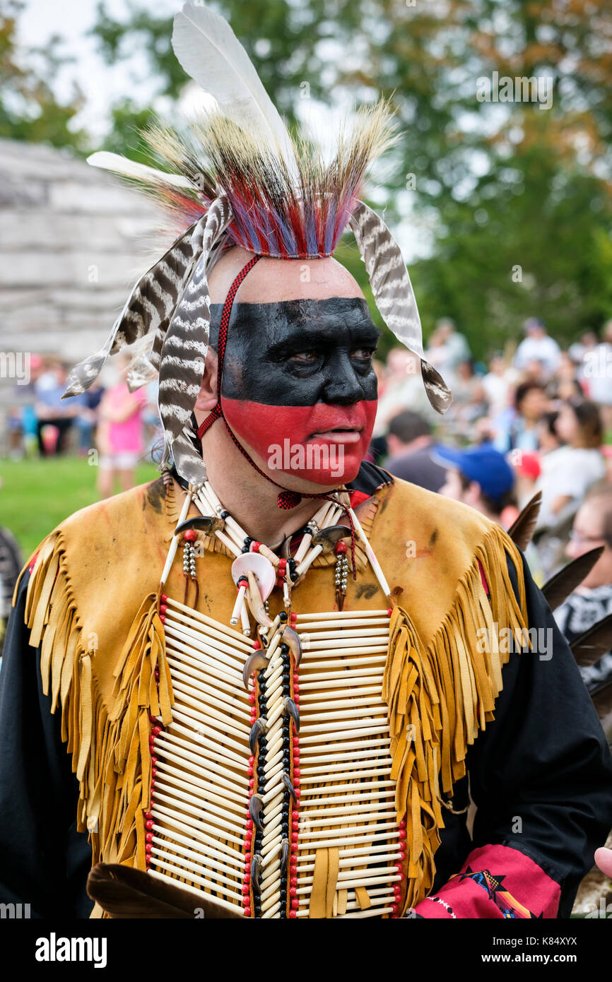 First Nations Wahta Mohawk warrior wearing war face paint during a Pow Wow, Canada indigenous celebration in London, Ontario, Canada. Stock Photo