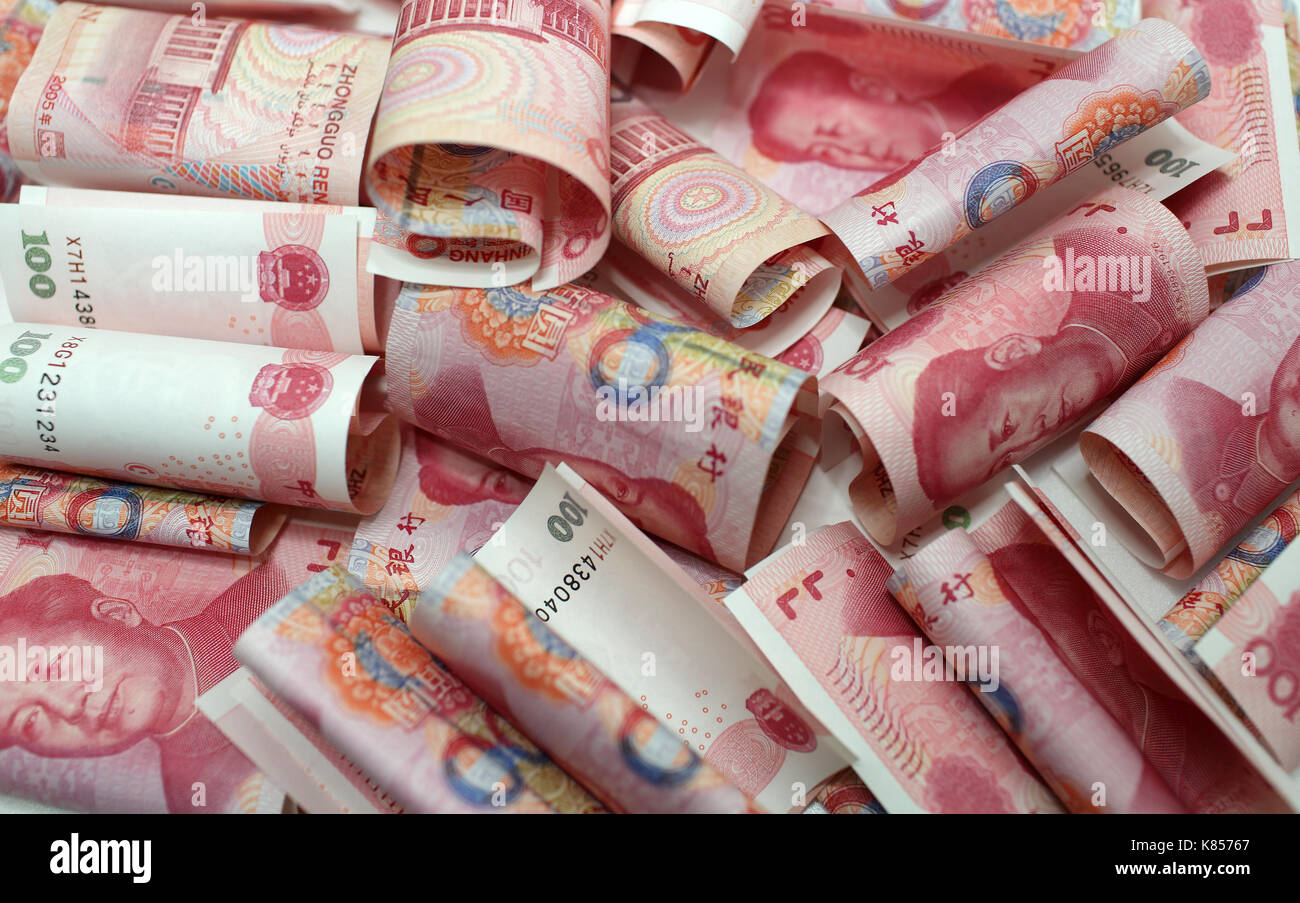 mess chinese yuan money 100 rmb background with Mao Zedong portrait old money Stock Photo