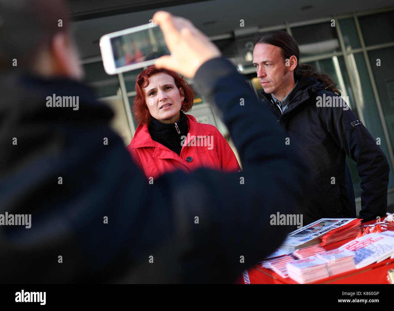 Berlin, Germany. 18th Sep, 2017. Katja Kipling, the leader of Die Linke  (Left Party), with the party's candidate in the borough of  Friedrichshain-Kreuzberg Pascal Meisner on the campaign trail in Berlin,  Germany,