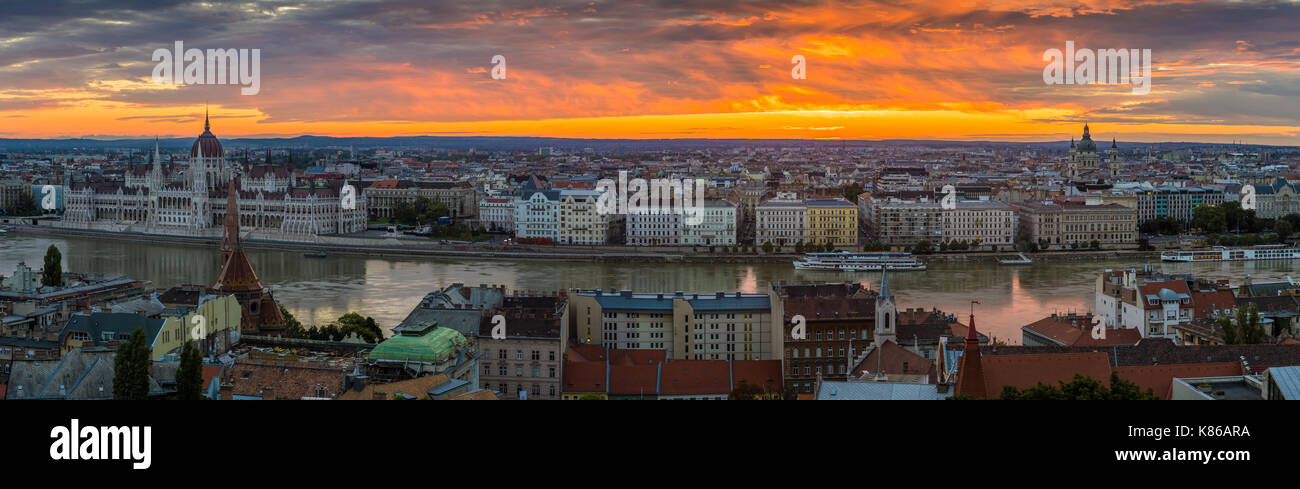 Budapest, Hungary - Panoramic skyline view of Budapest with the Parliament of Hungary and a beautiful golden sunrise taken from Buda Hill Stock Photo