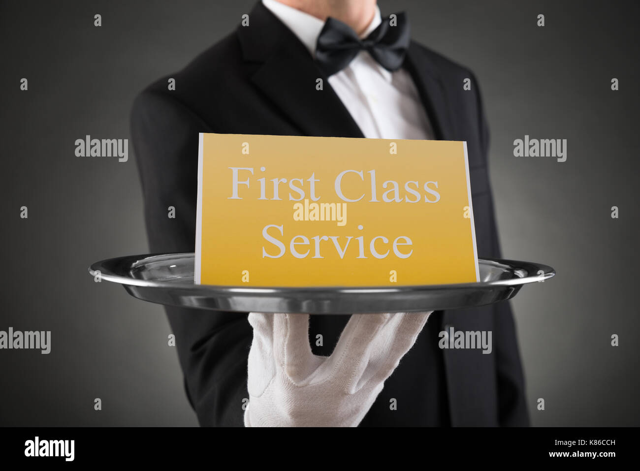 Waiter wearing uniform hi-res stock photography and images - Alamy