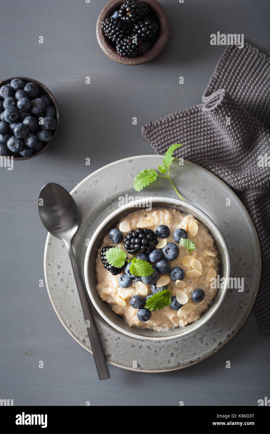 healthy breakfast steel cut oatmeal porridge with blueberry blackberry Stock Photo