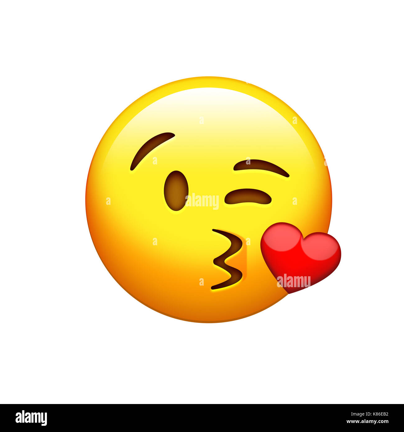 The isolated yellow smiley face with kissing mouth icon Stock Photo