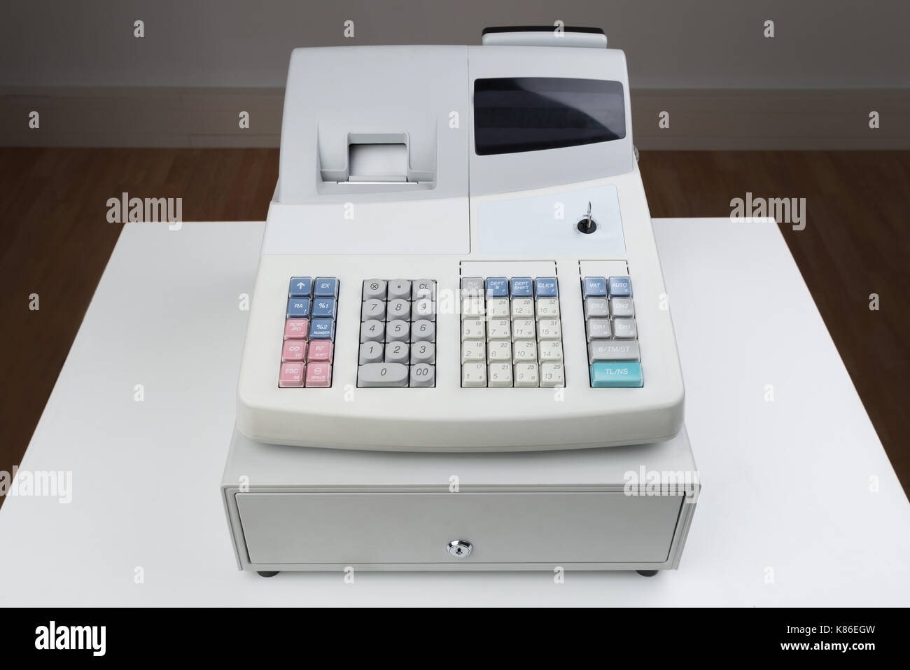 Close-up Of Electronic Cash Register Moneybox On Counter Stock Photo
