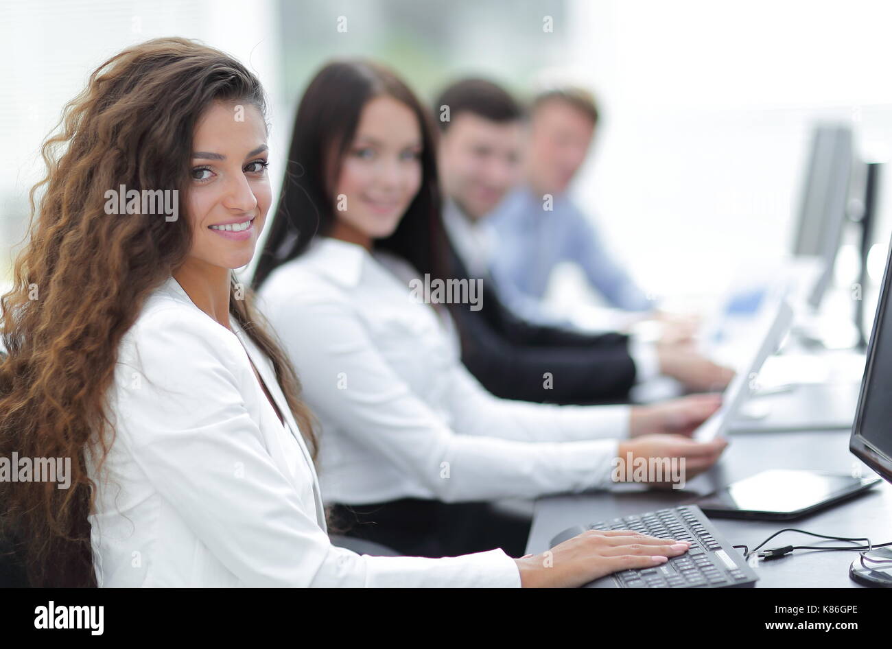 business woman on the background of business team Stock Photo - Alamy