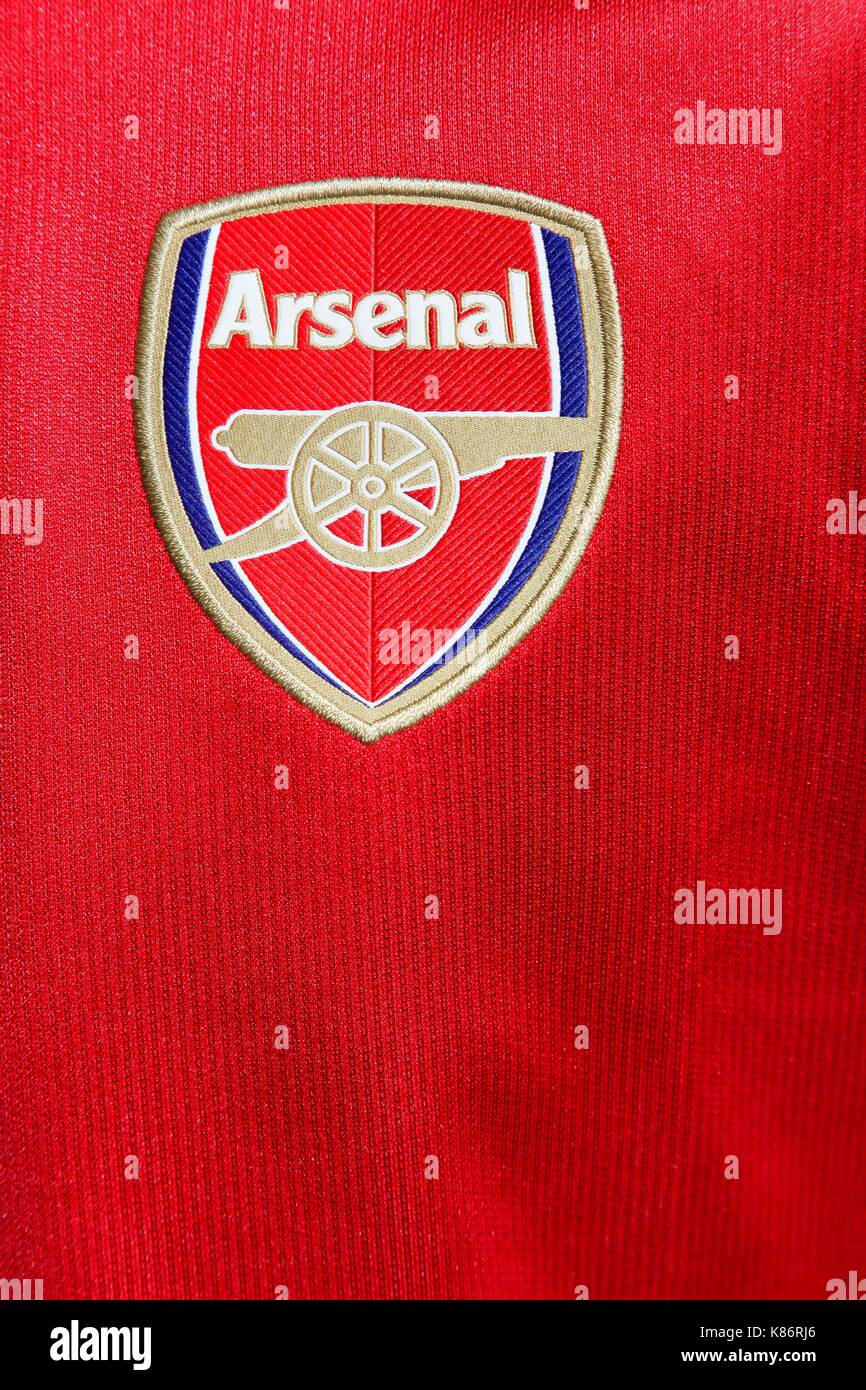 Odder, Denmark - August 8, 2017: Logo of Arsenal Football Club on a red Jersey. Arsenal Football Club is a professional football club based in London Stock Photo