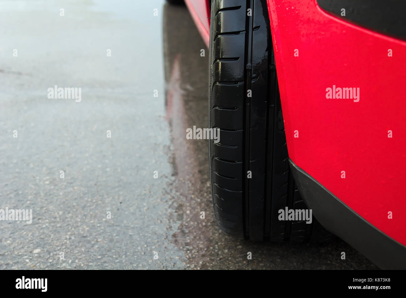 Tyre on sports car Stock Photo Alamy