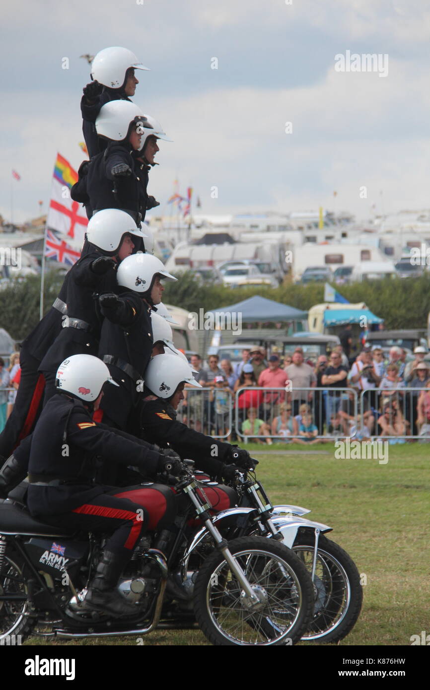 BRITISH ARMY ROYAL SIGNALS WHITE HELMETS MOTORCYCLE DISPLAY TEAM Stock Photo