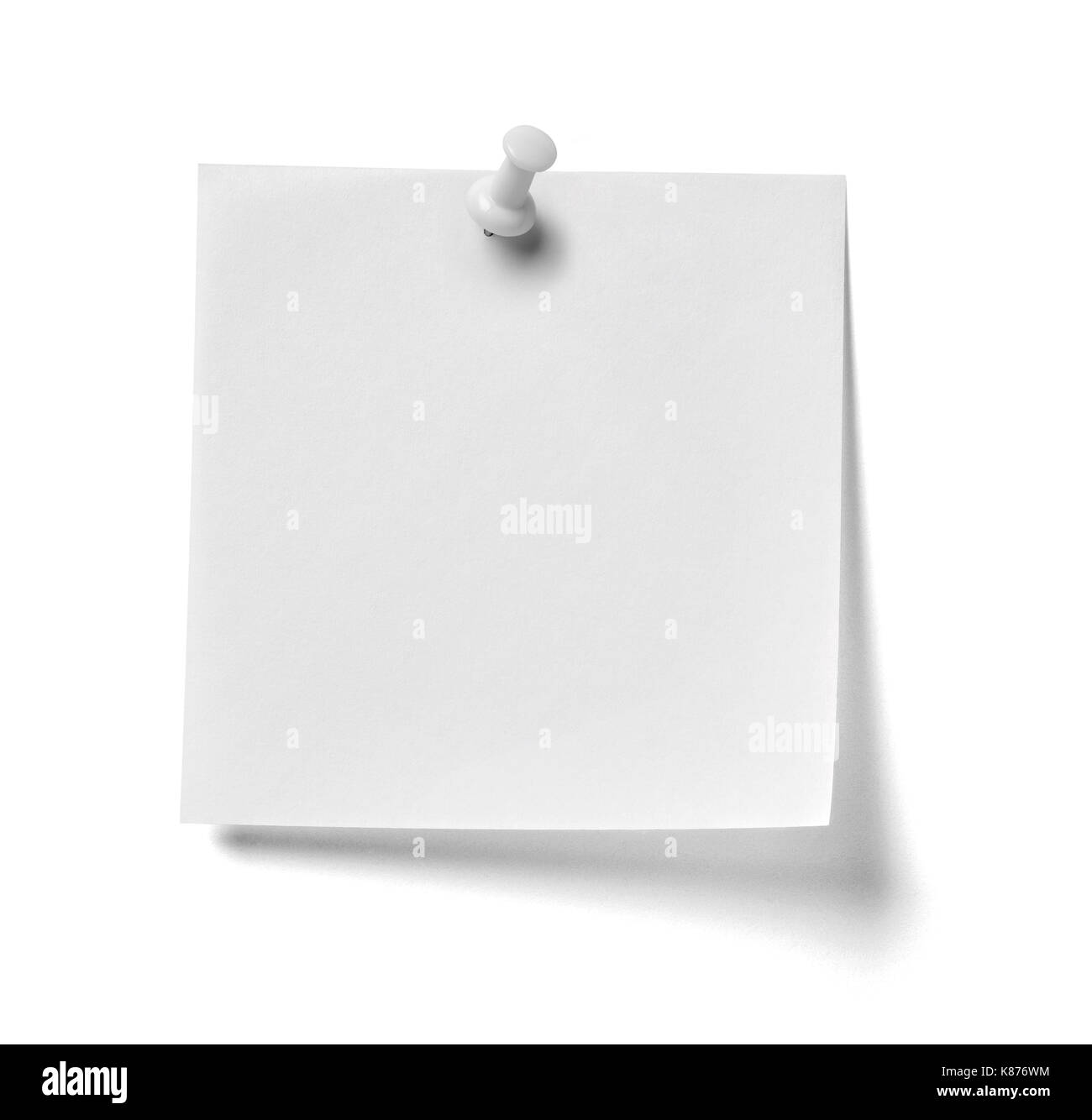 close up of  a note paper with a white push pin on white background Stock Photo