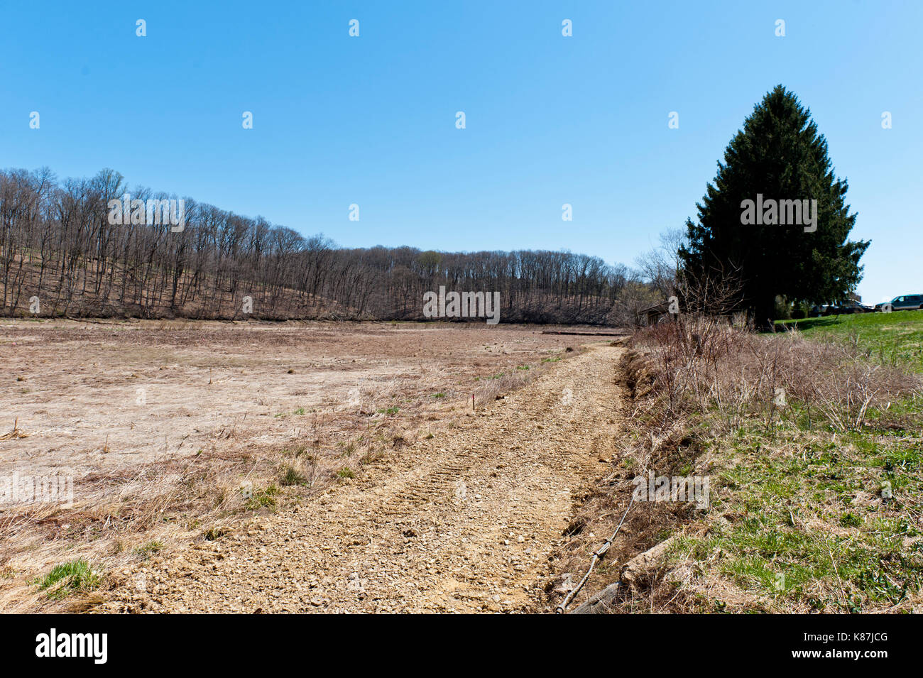 CONSTRUCTION PATH THROUGH DRY LAKE BED OF SPEEDWELL FORGE LAKE AFTER DRAINING DUE TO DAM DAMAGE, LITITZ PENNSYLVANIA Stock Photo