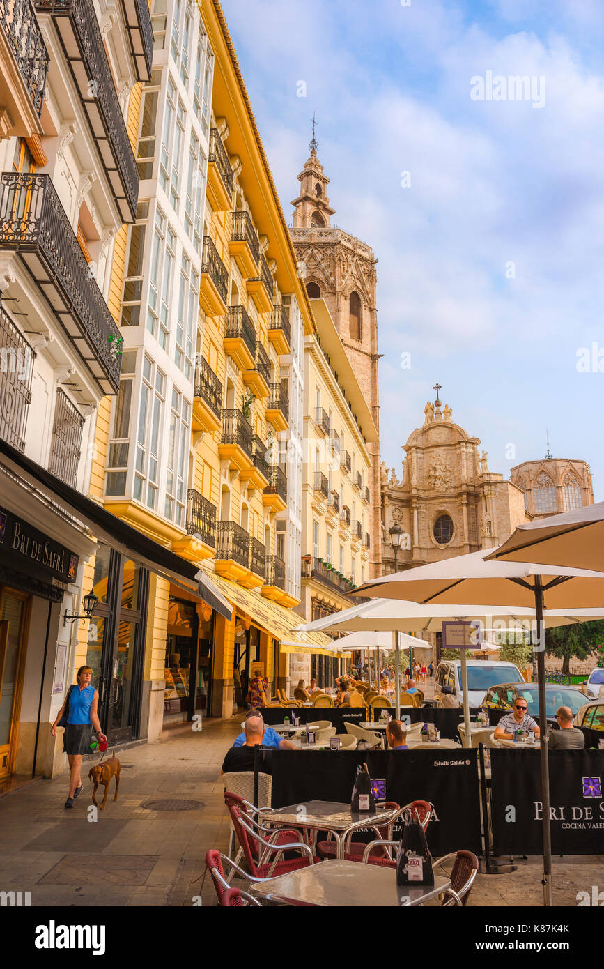 Valencia Spain, view of the west side of Plaza de la Reina in the historical centre of Valencia with the cathedral tower in the distance. Stock Photo