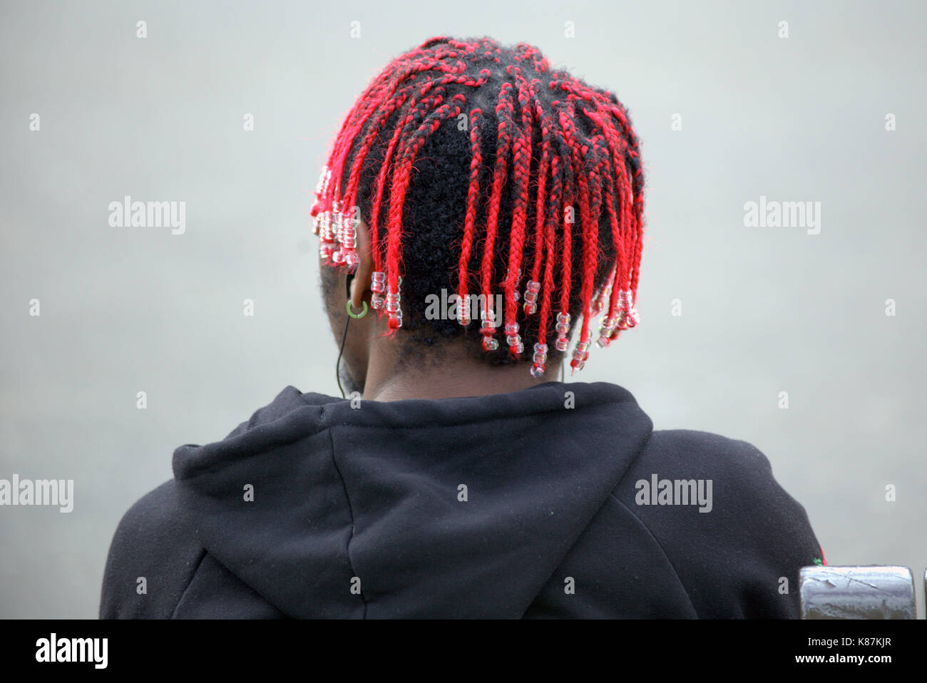 black guys males with braided hair dreadlocks  viewed from behind Stock Photo