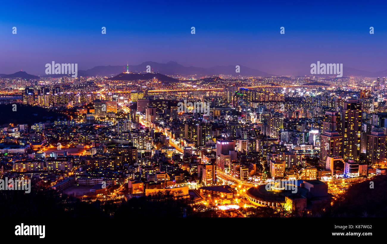 Seoul cityscape and Seoul tower at night. Traffic in Seoul, South Korea. Stock Photo