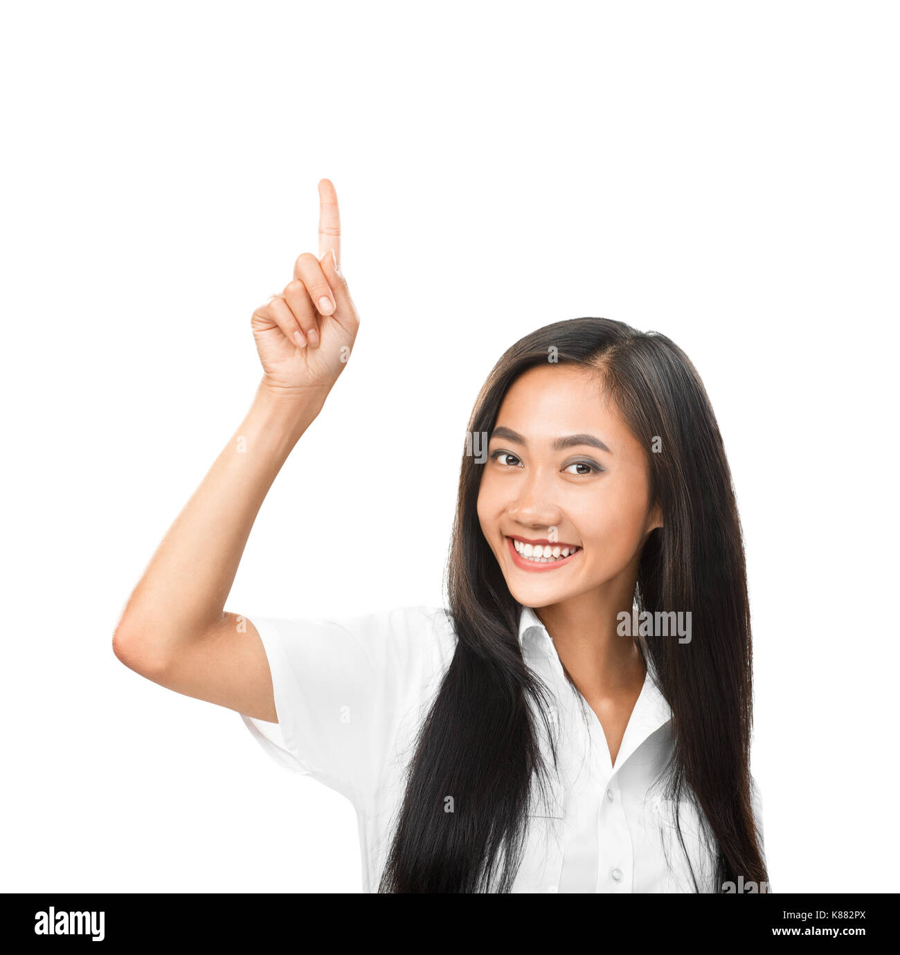 Asian woman pointing upwards hi-res stock photography and images - Alamy