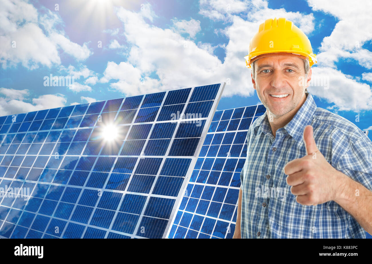 Mature Man With Photovoltaic Solar Panel Showing Thumb Up Stock Photo
