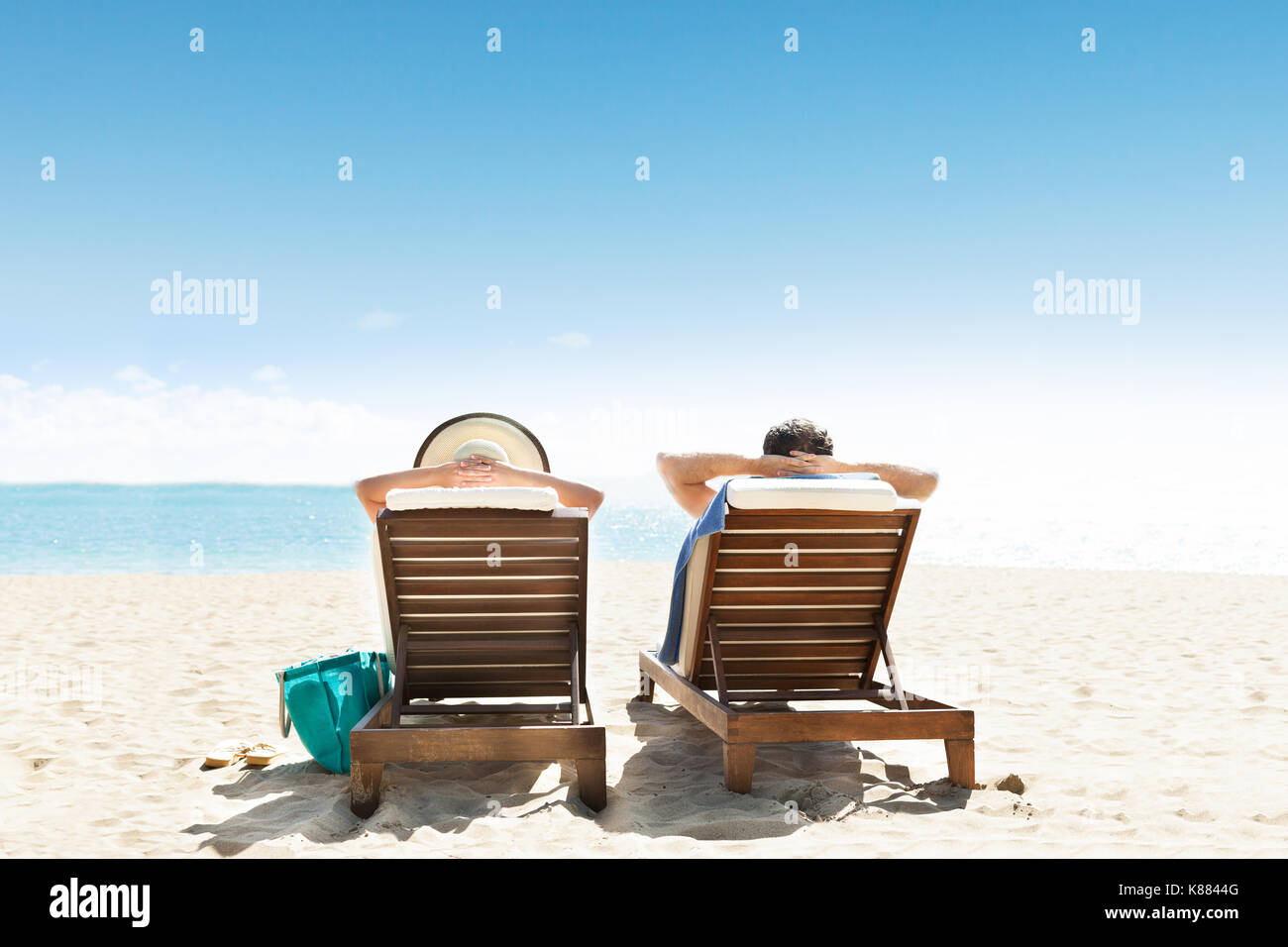 Man chair beach behind hi-res stock photography and images - Alamy