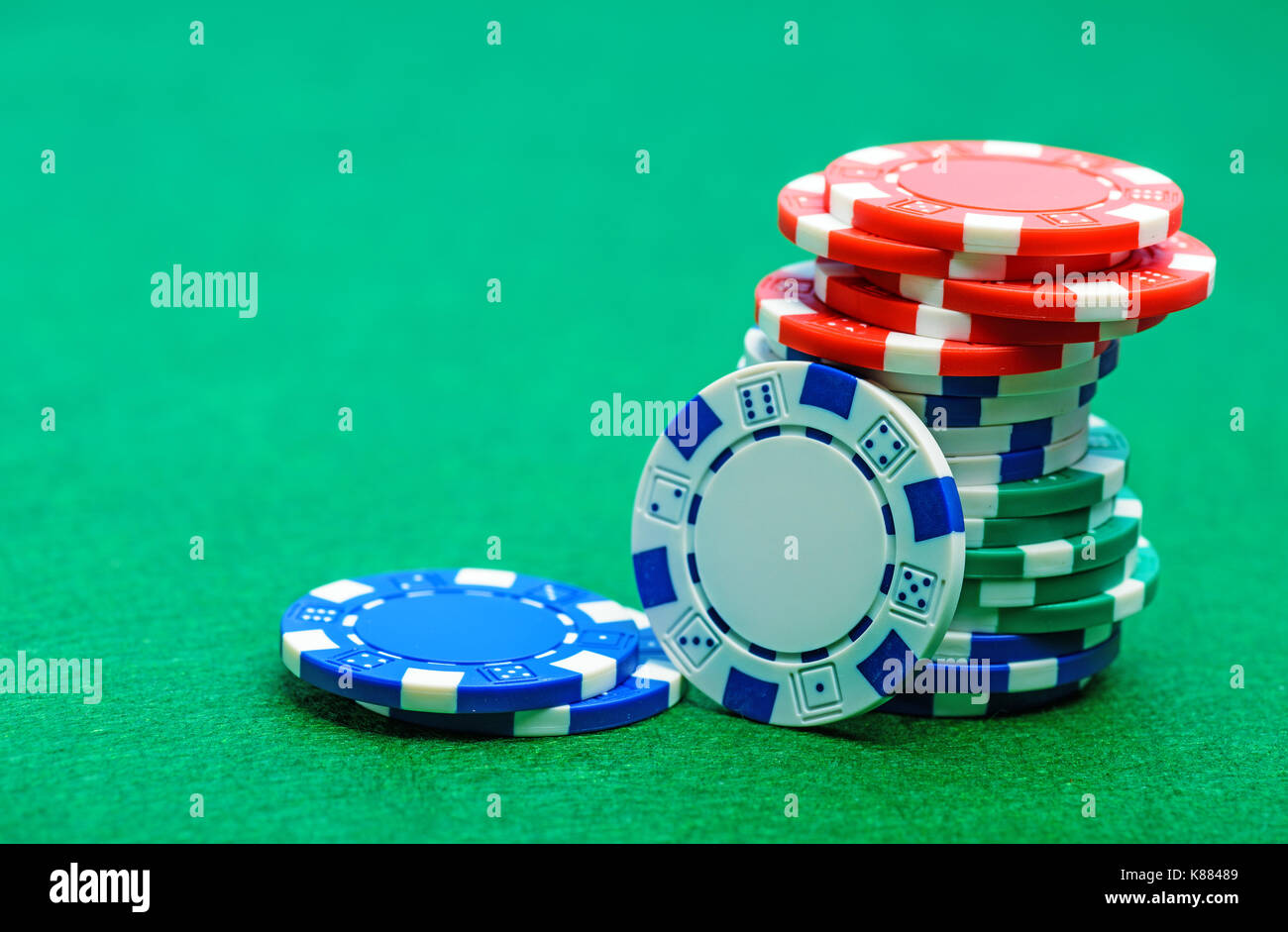 Clipart of Stacks of Casino Poker Chips and Dice - Royalty Free