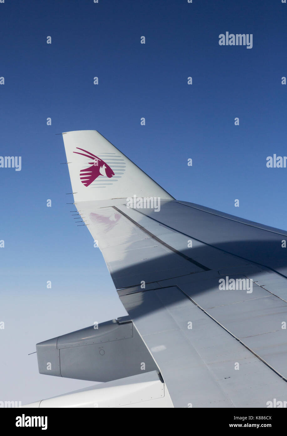 Qatar Airways logo on the wingtip of an A330 Qatar Airways plane Stock Photo