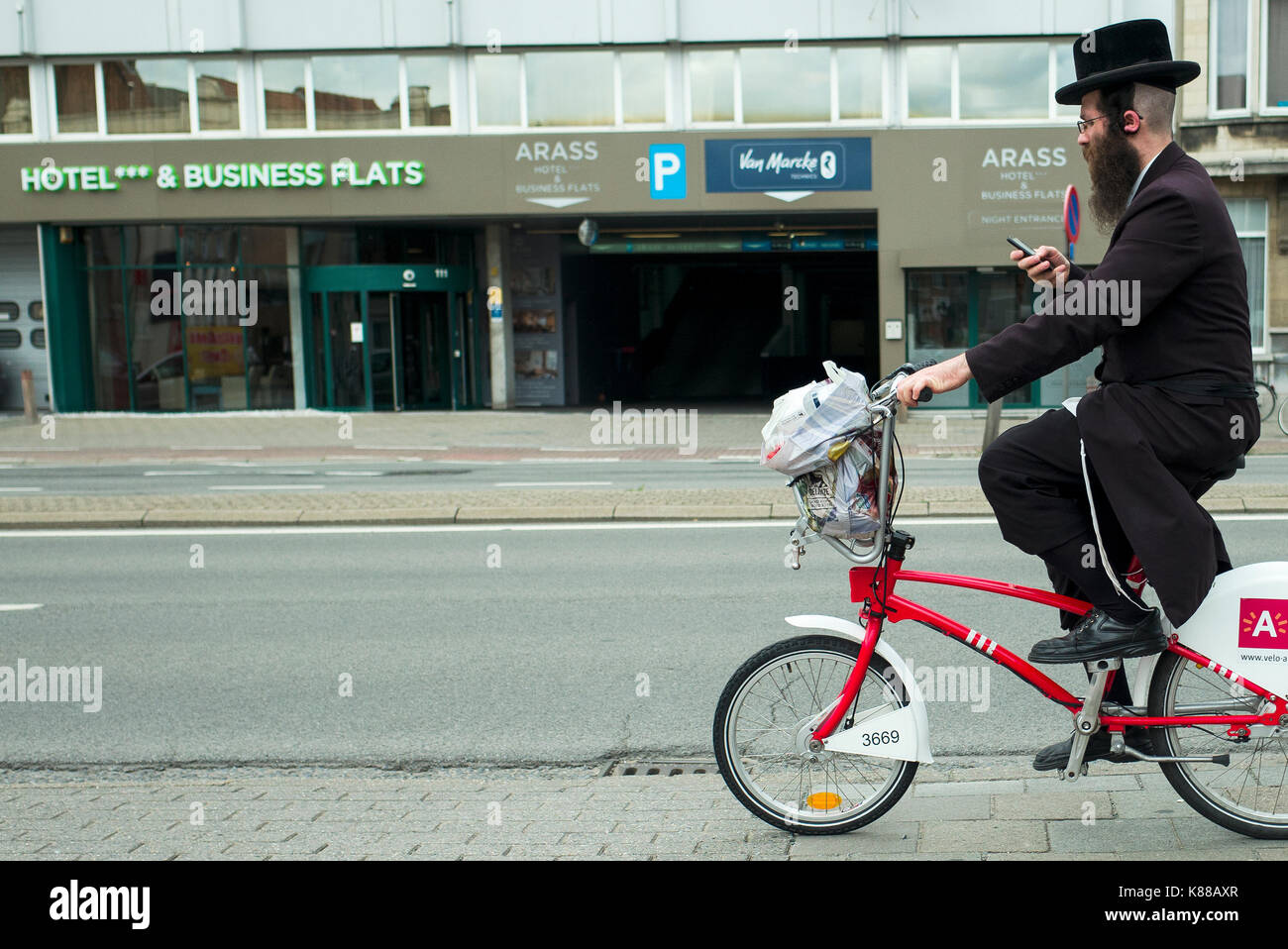 Jewish group with bikes Antwerp Stock Photo