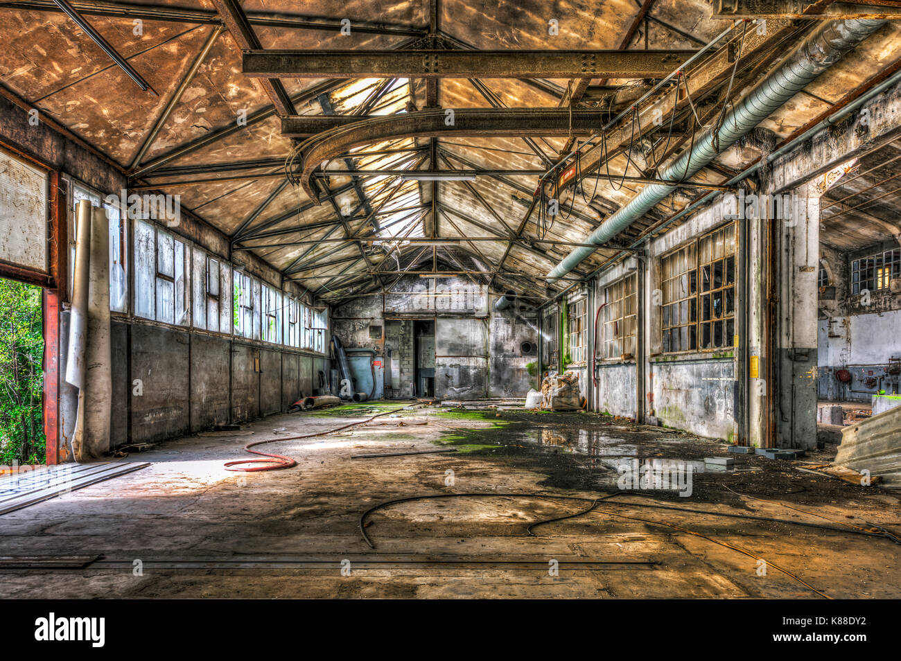 Dilapidated warehouse in an abandoned factory Stock Photo