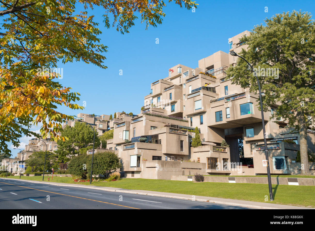 Montreal, Canada - 9 June 2017: Cruise Ship passing in front of Habitat 67 housing complex in the Old Port of Montreal Stock Photo