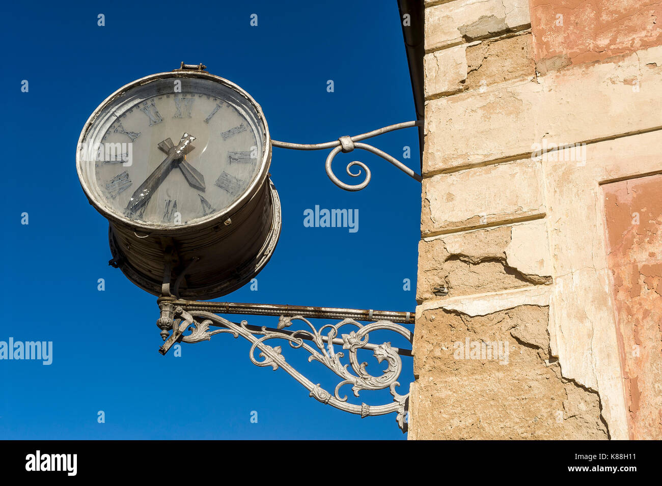 the old street wall clock Stock Photo
