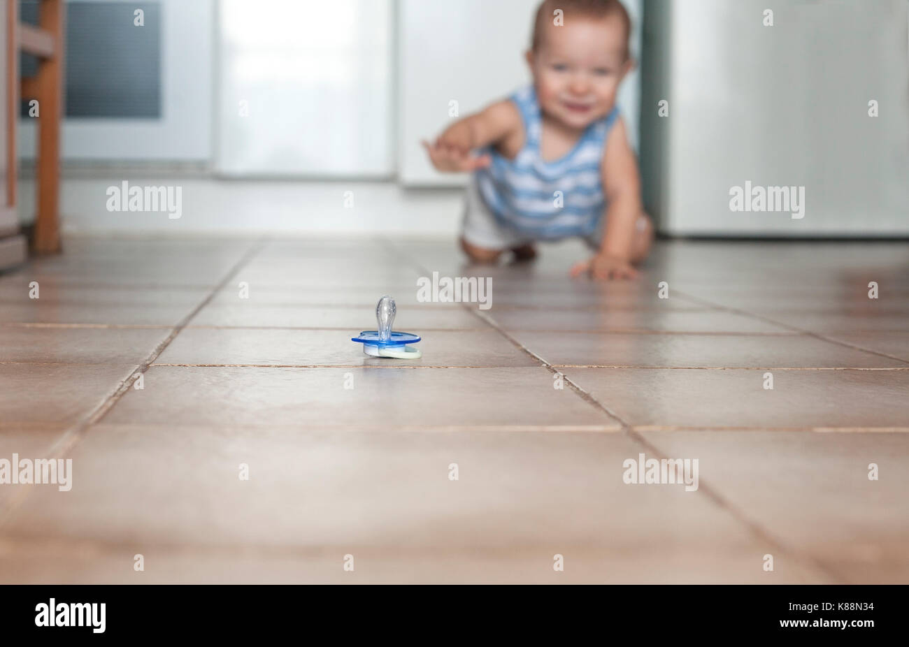 Baby kitchen pacifier hi-res stock photography and images - Alamy