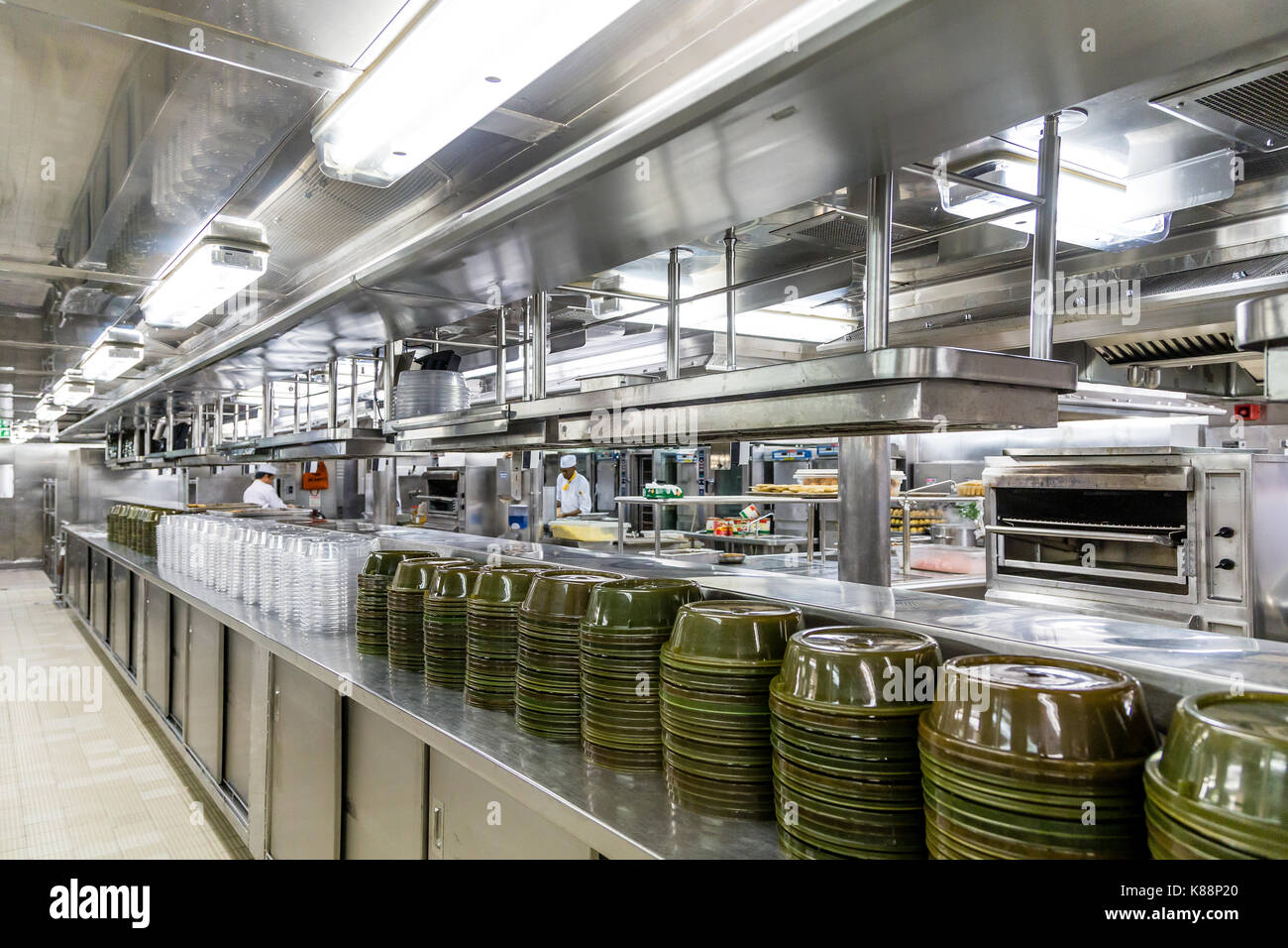 Stacks of Empty Serving Dishes in Commercial Kitchen Stock Photo Alamy