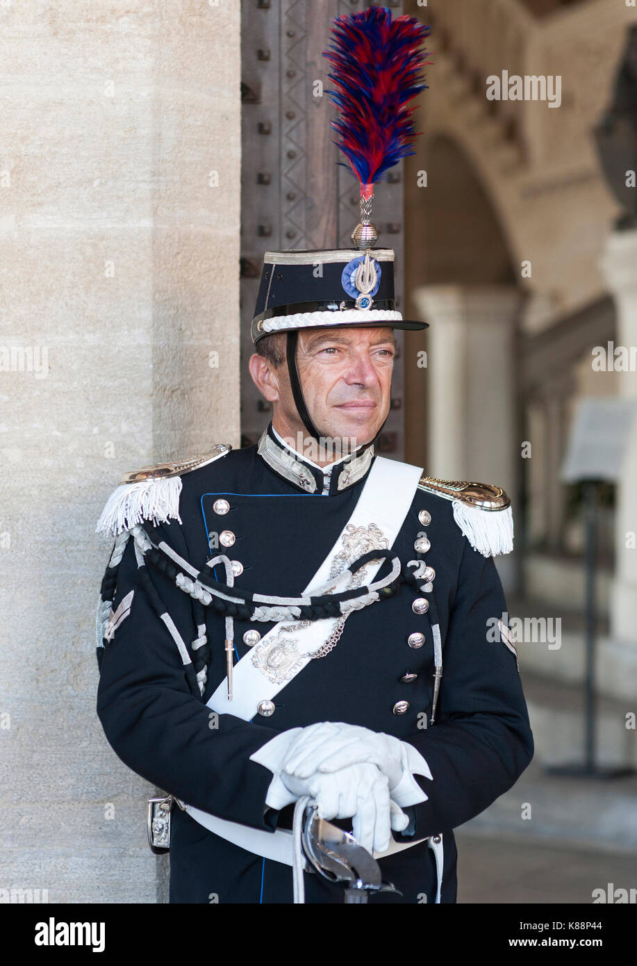 Uniformed guard outside the Palazzo Pubblico (Public Palace) in San Marino. Stock Photo