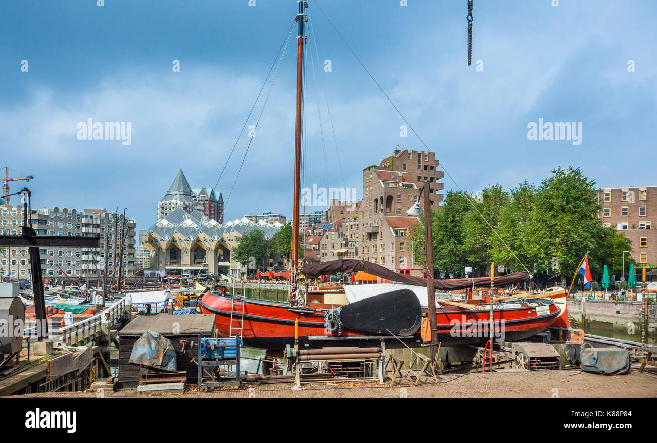 Netherlands, South Holland, Rotterdam, Maritime Museum Harbour, Oudehaven, Scheepsshelling Koningspoort historic shipyard, in the background Piet Blom Stock Photo