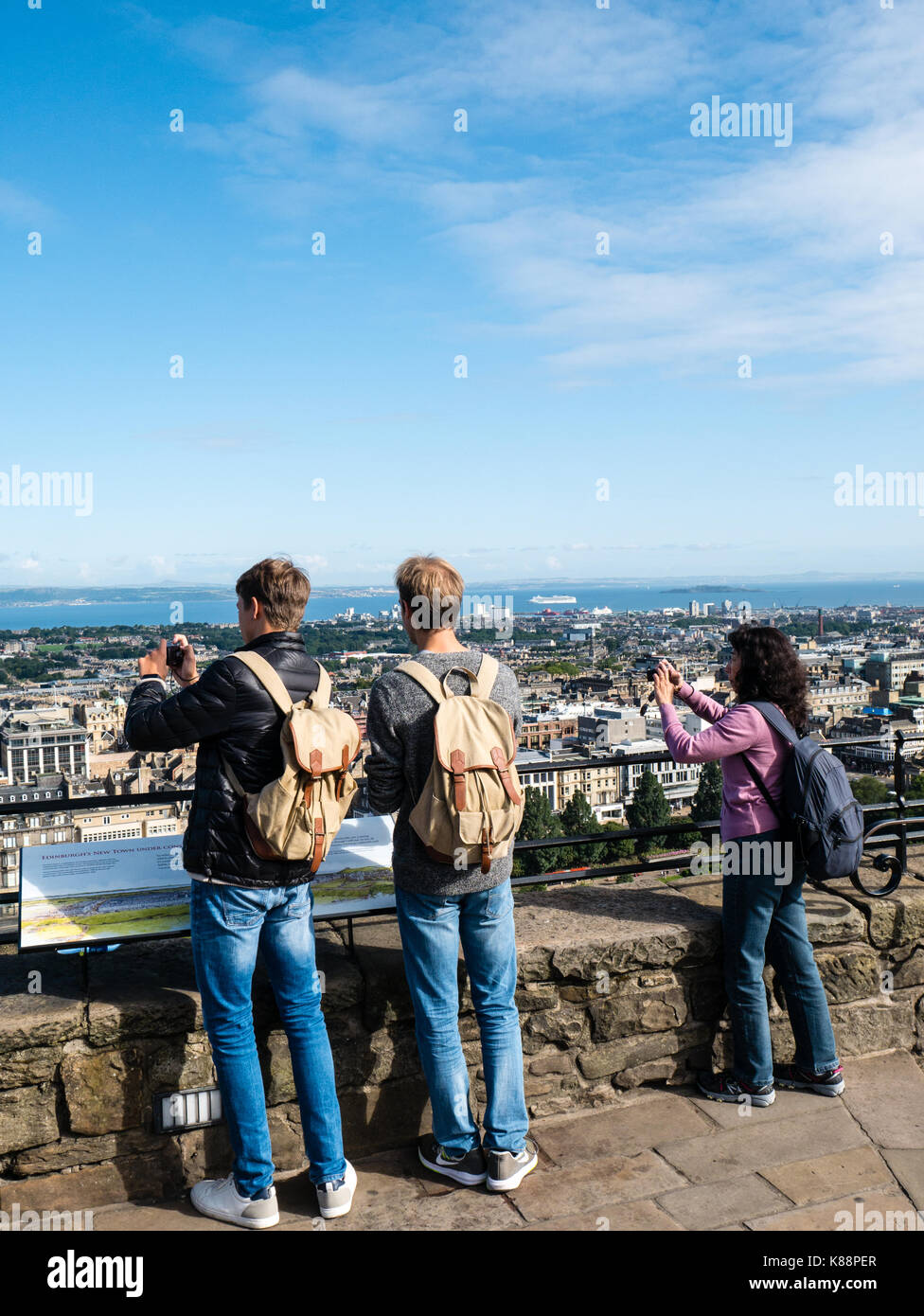 Tourists taking Photos of Edinburgh City, from Edinburgh Castle, Edinburgh, Scotland, UK, GB. Stock Photo