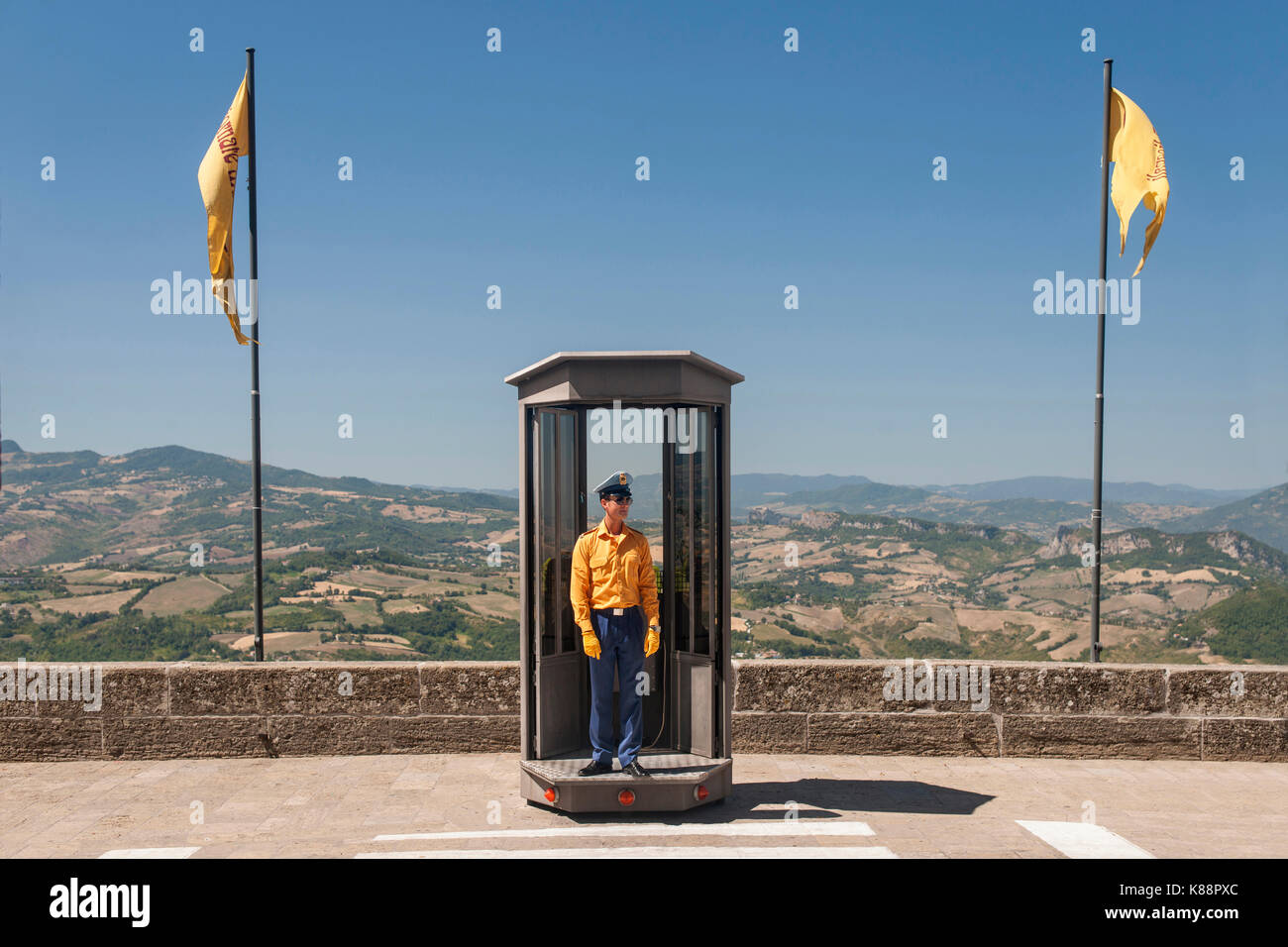 Crossing guard / traffic controller in the historic old city of San Marino in the republic of San Marino. Stock Photo