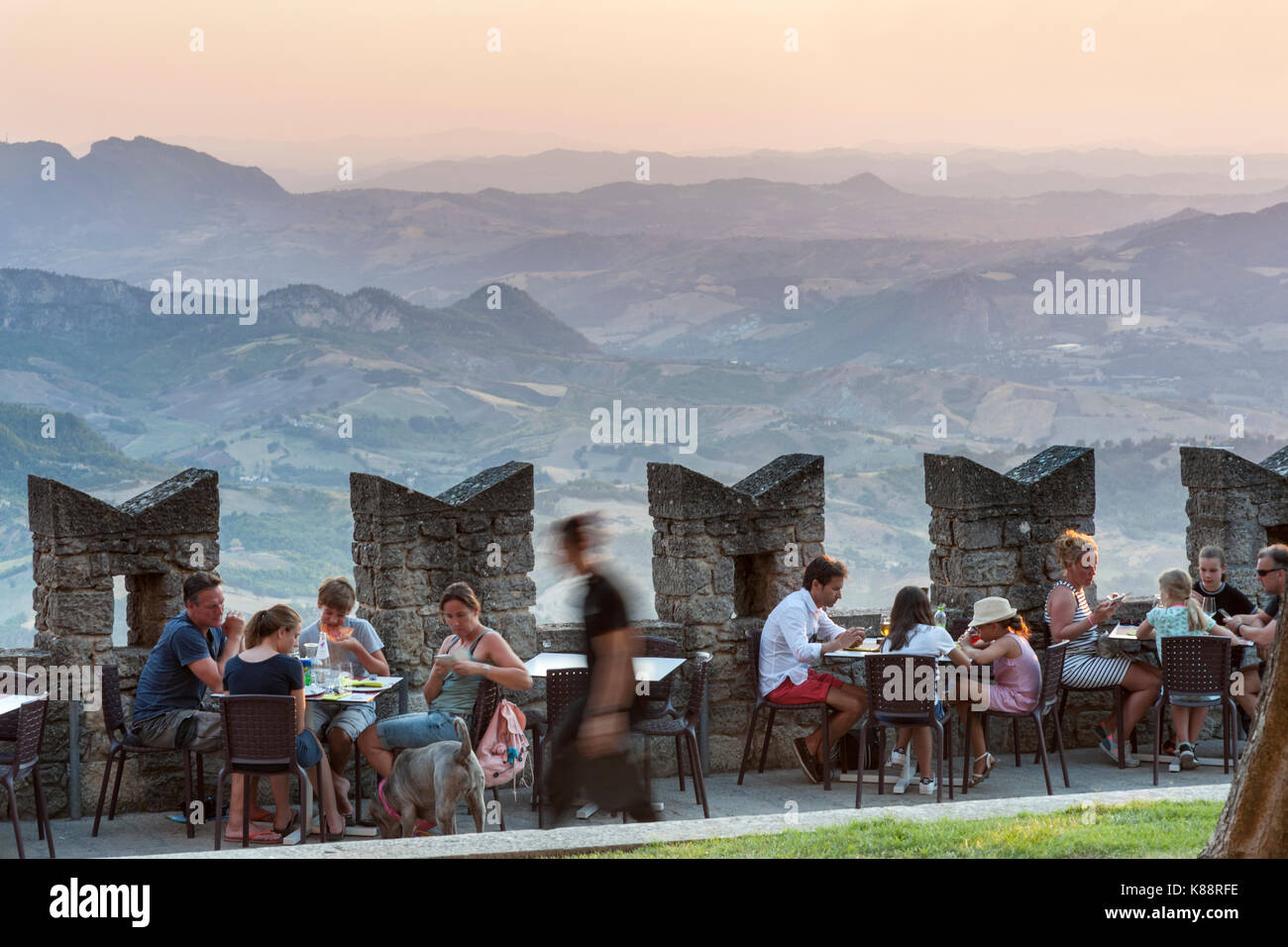 Outdoor café/restaurant on the ramparts of the old town of San Marino in the republic of San Marino. Stock Photo